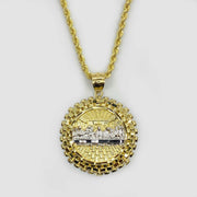 Two-tone gold Divine Last Supper pendant necklace on gold rope chain.