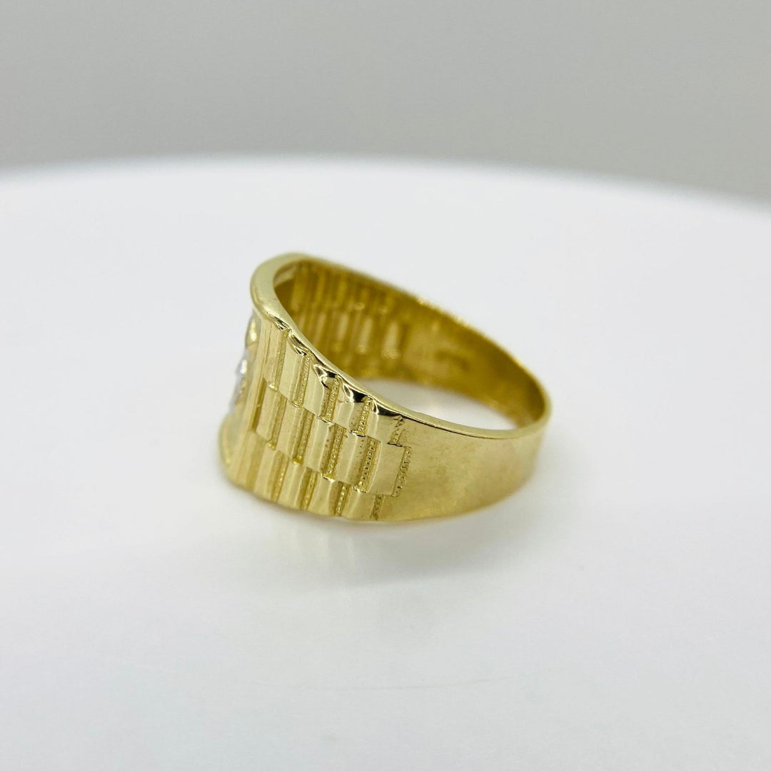 10k - 14k Gold Rollie Band ring with a dollar sign and textured band side view 