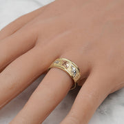 10k and 14k gold elephant band displayed elegantly on a finger.