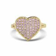Front view of a gold heart-shaped ring paved with pink cubic zirconia gemstones.