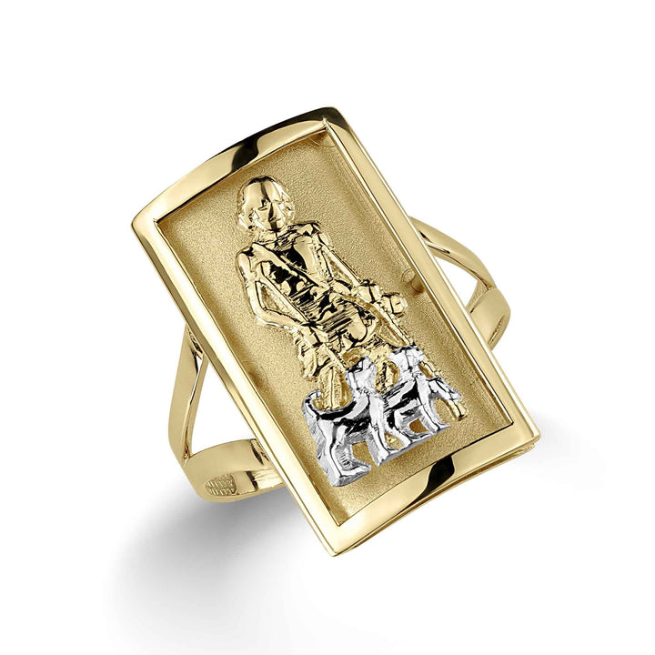 Gold rectangle ring with a silver-toned Jesus and sheep design on white background.