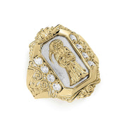 Side angle of two-tone gold Grim Reaper ring showing clear cubic zirconia side stones.