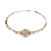 Two-tone gold Guadalupe bracelet featuring a central rose gold Virgin Mary medallion