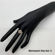 Black mannequin hand wearing a 10k - 14k gold oval ring with Size 5 text.