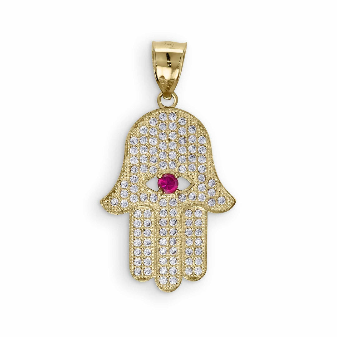 A gold Hamsa hand pendant covered in sparkling cubic zirconia stones with a central pink gemstone.