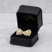 10k and 14k gold heart nugget CZ stud earrings displayed in a black jewelry box.