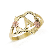 Two-tone gold ring featuring a diamond-cut initial A inside a rose gold floral heart.