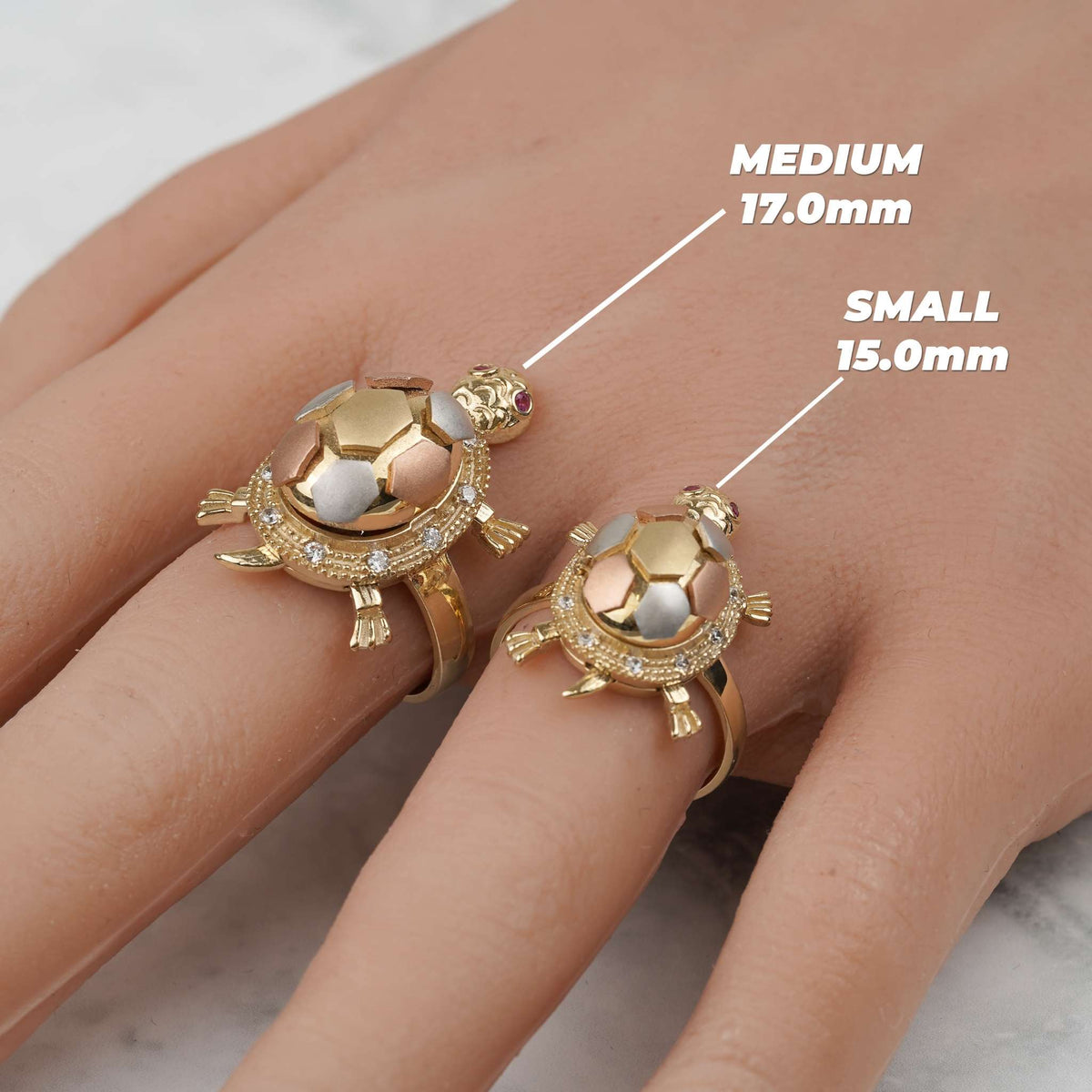 Gold turtle locket ring size comparison showing medium 17.0mm and small 15.0mm.