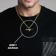 A man wearing a black shirt and gold chain displaying Size 1 (42.0mm) AK-47 pendant.