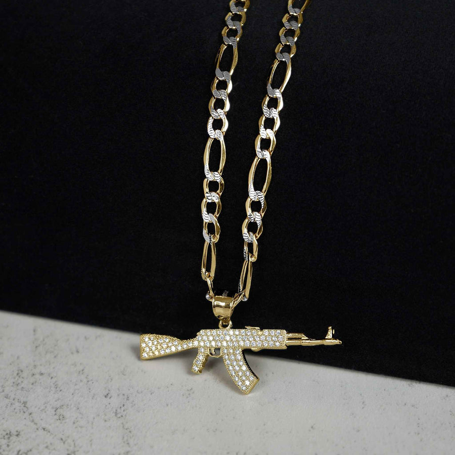 A gold chain necklace featuring an iced AK-47 pendant against a split background.