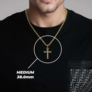 Man wearing a gold cross pendant necklace with text overlay reading MEDIUM 38.0mm.
