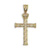 Close-up of a gold cross pendant showing the intricate Greek key engraving on the shaft and crossbar.