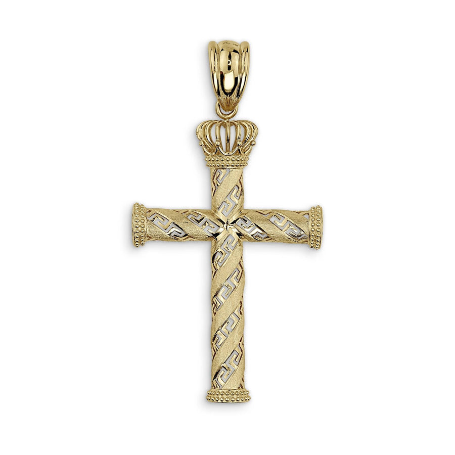 Close-up of a gold cross pendant showing the intricate Greek key engraving on the shaft and crossbar.