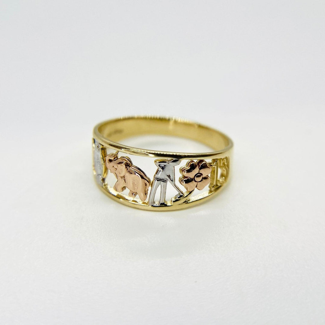 10k - 14k Gold ring with three different animal figures on a white background