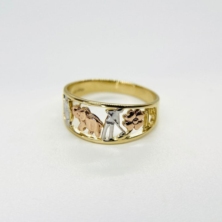 10k - 14k Gold ring with three different animal figures on a white background