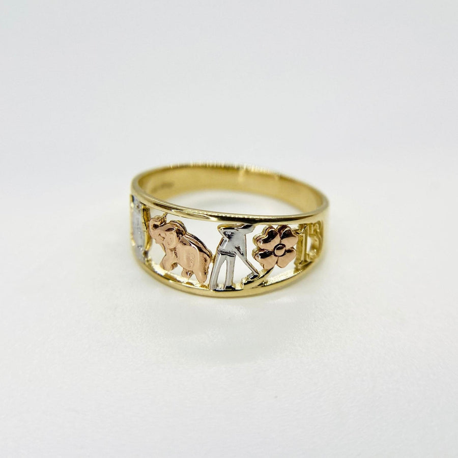 10k - 14k Gold ring with three different animal figures on a white background