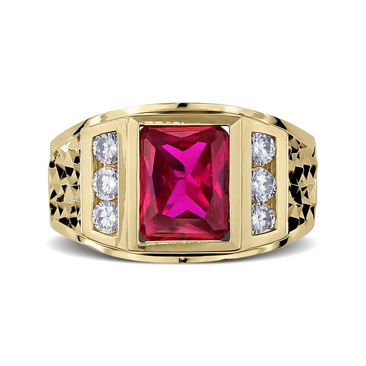Yellow gold men's signet ring with a rectangular red gemstone and diamond-accented shoulders.
