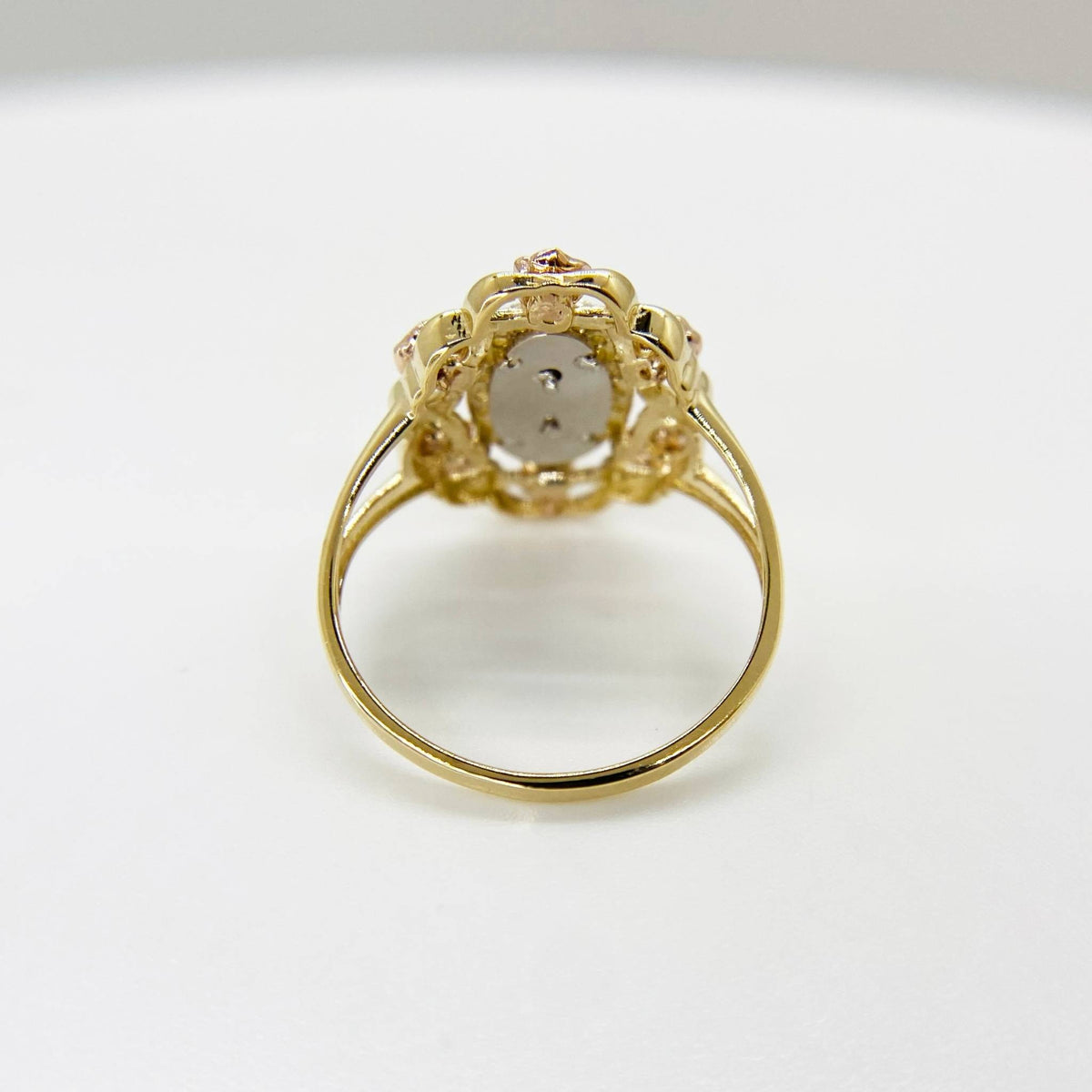 10k & 14k tri-color gold Virgin Mary ring side view showing rose and yellow gold tones