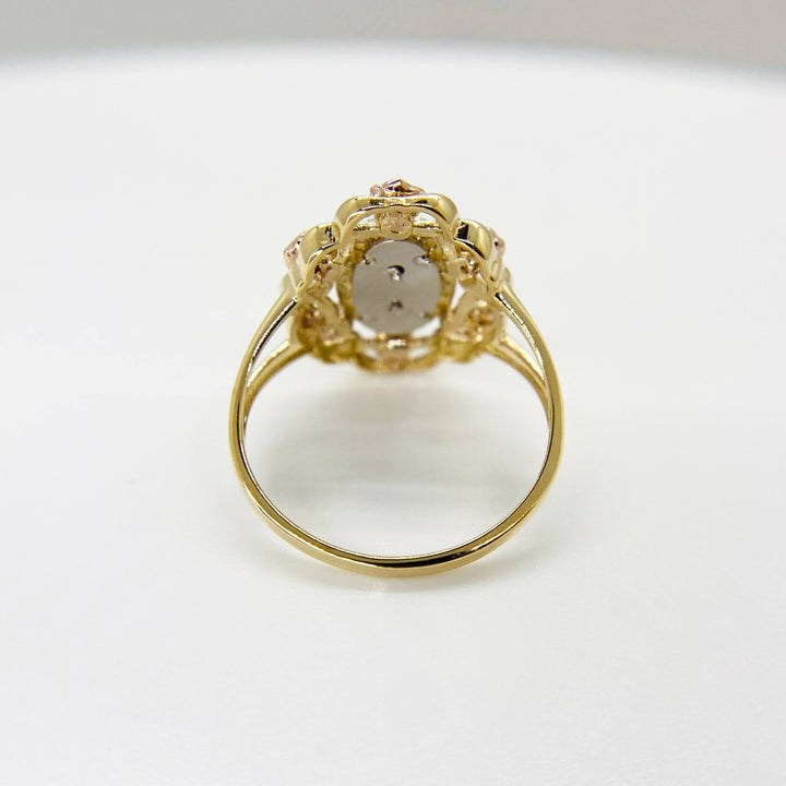 10k & 14k tri-color gold Virgin Mary ring side view showing rose and yellow gold tones