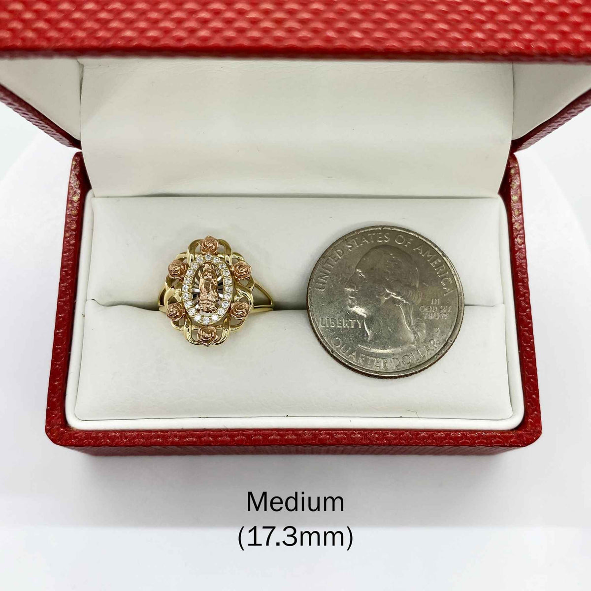 10k - 14k Gold ring with Virgin Mary Guadalupe design next to a quarter.