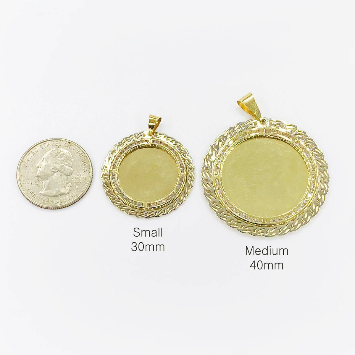 Small 30mm and medium 40mm round CZ gold picture pendants next to a quarter.