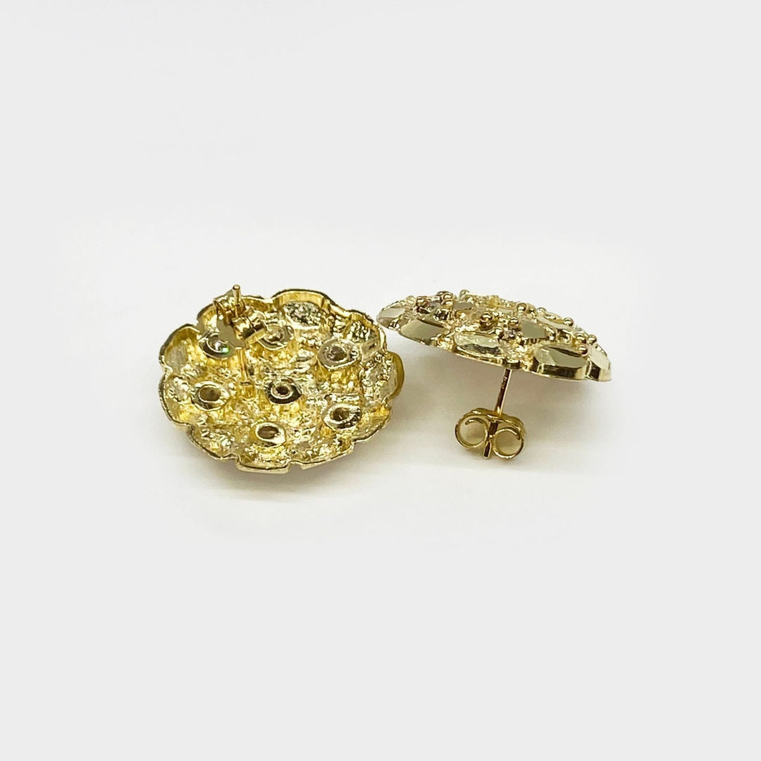 Rear view of two round gold nugget stud earrings showing screw back posts.