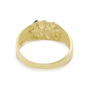 Textured yellow gold Oli nugget ring angled upward against a solid white background.