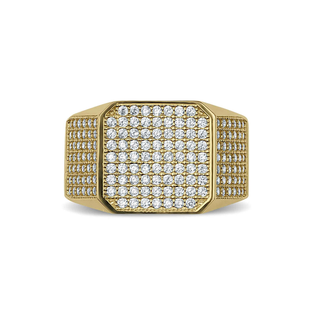 Close-up of a square-cut yellow gold signet ring encrusted with brilliant cubic zirconia stones.