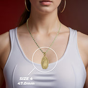 Model wearing a gold chain with the 47.0mm Guadalupe pendant highlighted in white.