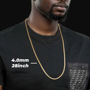 Model wearing a 4.0mm, 28-inch 10k & 14k gold pavé Franco chain over a black t-shirt.