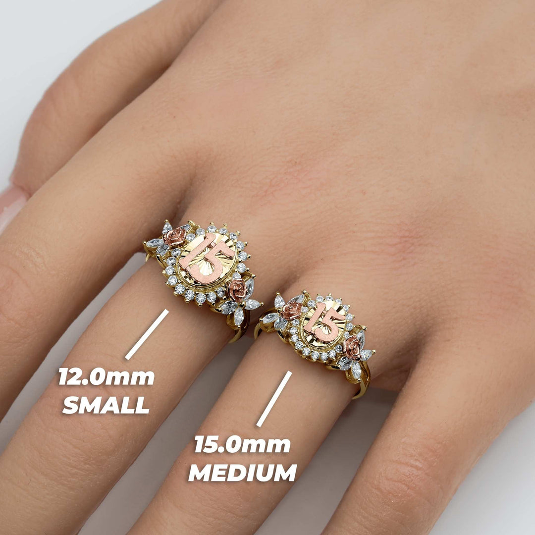 Hand wearing 12.0mm small and 15.0mm medium two-tone gold Quinceañera rings.