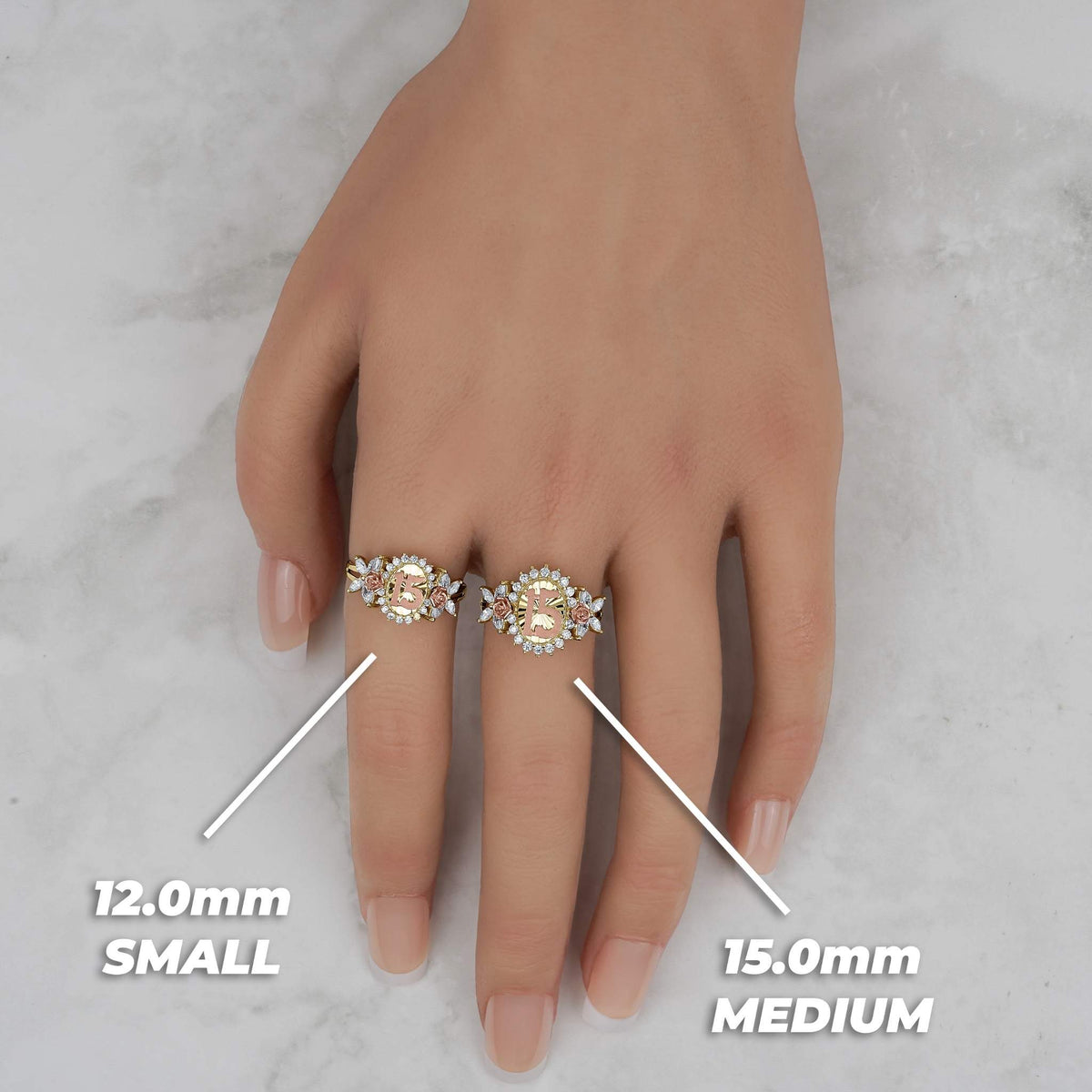 Model displaying small and medium sizes of a tricolor gold birthday ring.
