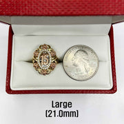 10k - 14k Gold  Quinceanera Bloom Rose ring next to a silver coin.