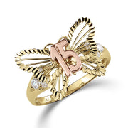Two-tone gold Quinceañera 15 ring with large butterfly and cubic zirconia on white