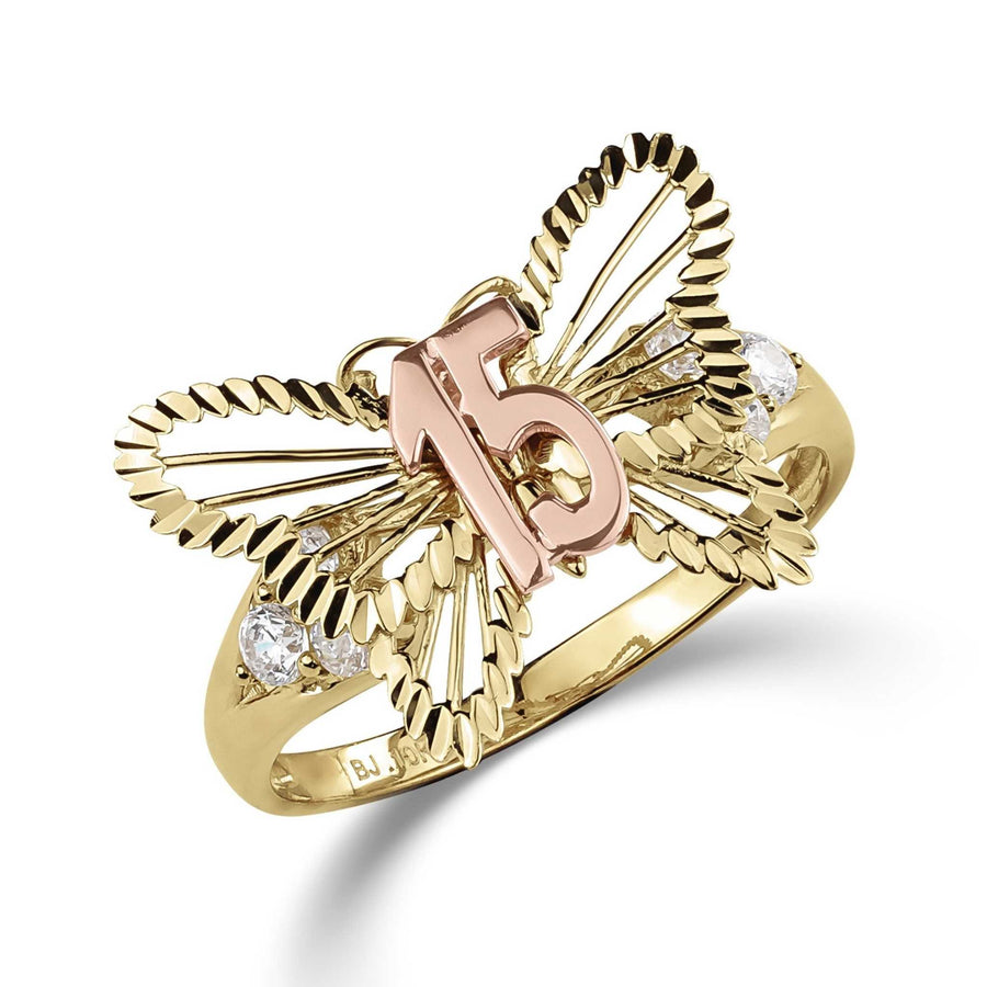 Two-tone gold Quinceañera 15 ring with large butterfly and cubic zirconia on white