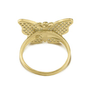 Inner view of gold Rav butterfly CZ ring on a white background.
