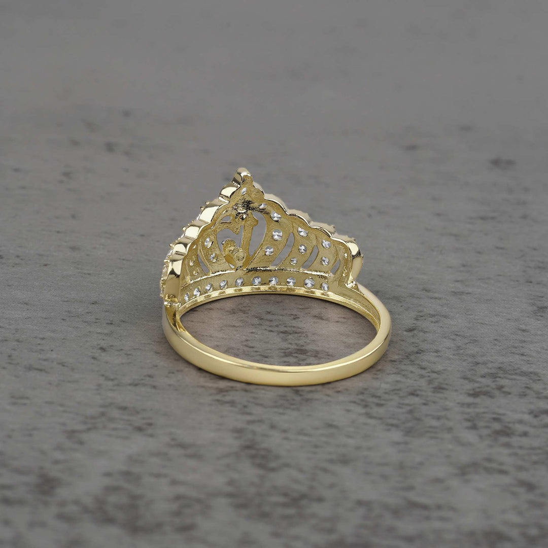 10k - 14k Gold crown-shaped ring back view on a gray surface