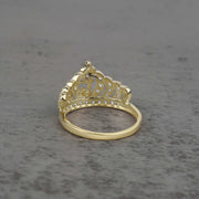 10k - 14k Gold crown-shaped ring back view on a gray surface