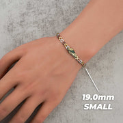 Small 19.0mm tricolor gold San Judas link chain bracelet worn on a wrist.