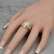 Mannequin hand wearing a two-tone gold San Judas royal ring with cubic zirconia.