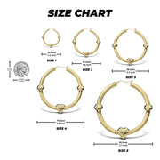 Size chart displaying five sizes of gold tre heart hoop earrings with a coin.