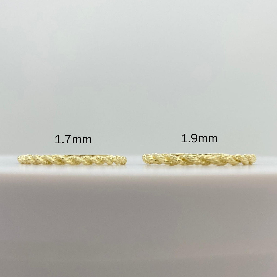 10k gold ultra slim rope ring on a white background, front view