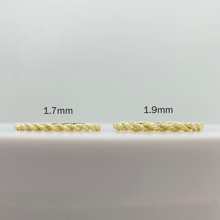 10k gold ultra slim rope ring on a white background, front view