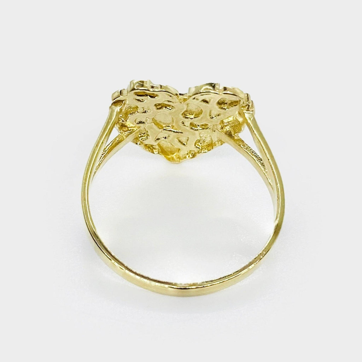 14k gold nugget heart ring close-up showing high-polish finish and texture