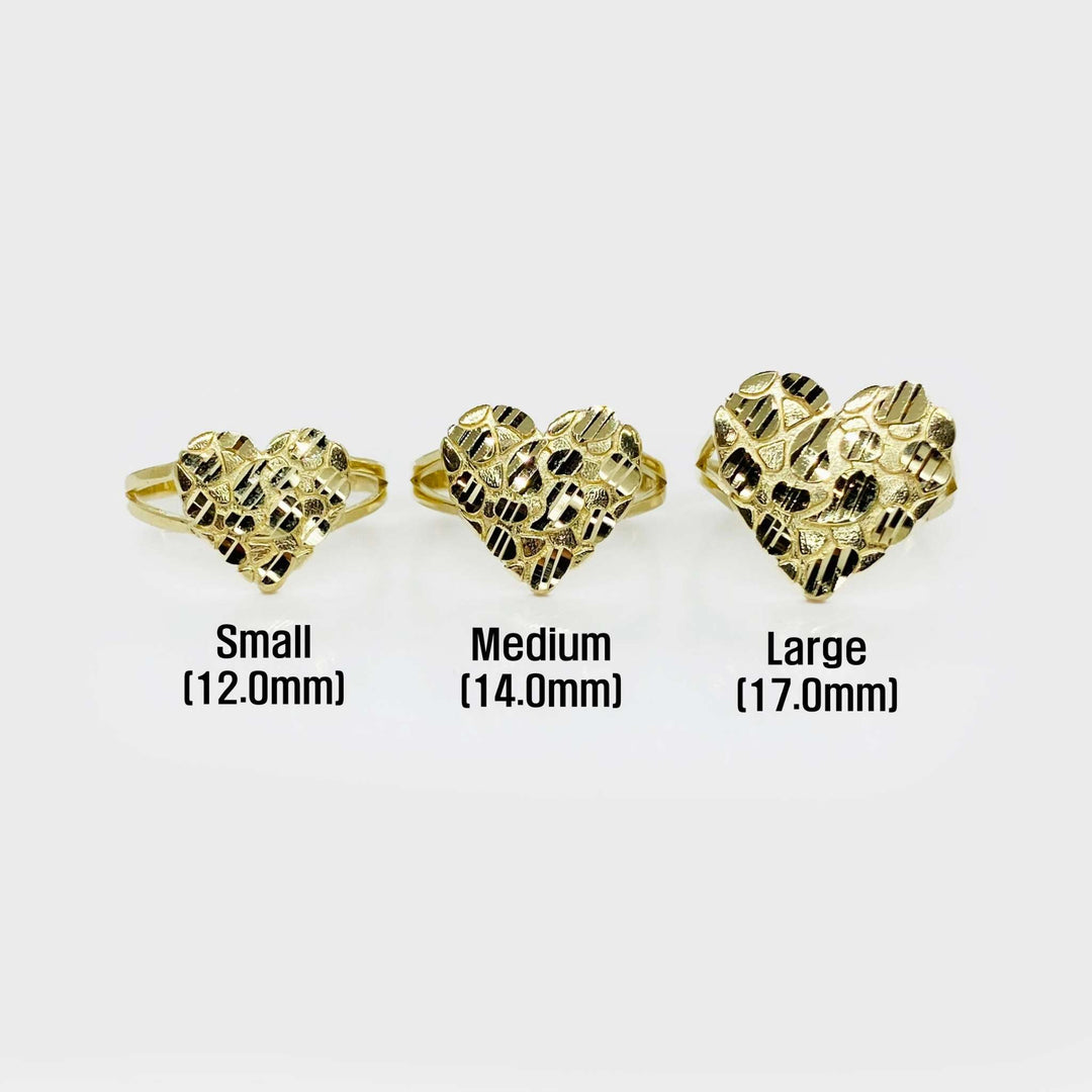 Three gold Velin Nugget heart-shaped rings of different sizes on a white background