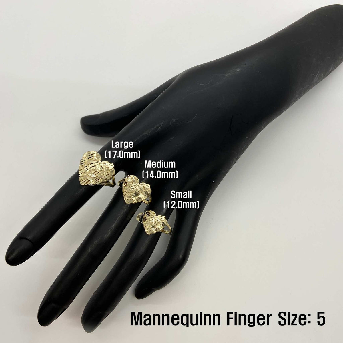 10k - 14k Velin Nugget Gold rings displayed on a black mannequin hand with size labels.