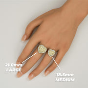Size comparison of two gold heart-shaped nugget rings on a finger with millimeter labels.
