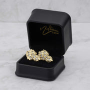 10k and 14k gold vintage nugget CZ stud earrings displayed in a black jewelry box.