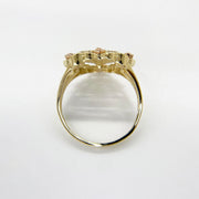 10k - 14k Gold heart shape ring top view on a white background