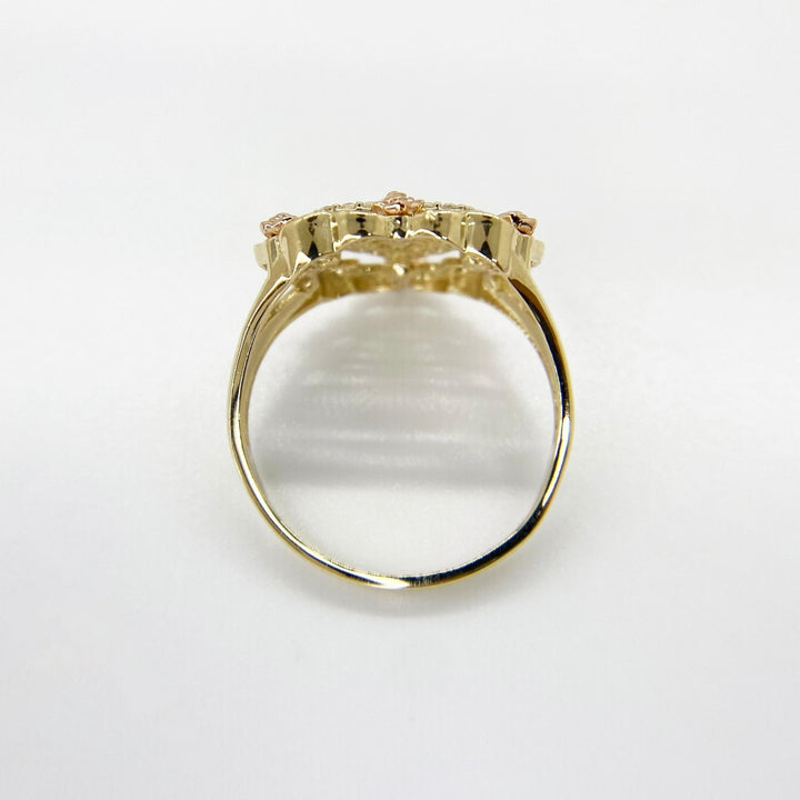 10k - 14k Gold heart shape ring top view on a white background